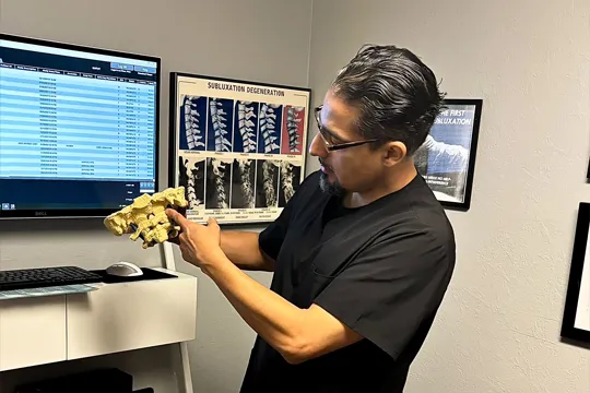 Chiropractor San Rafael CA Marlon Altan With Spine Example